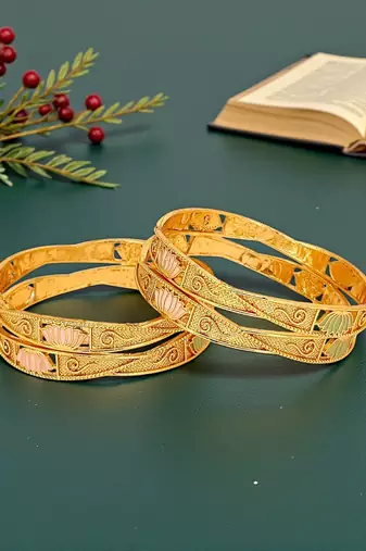 Set of 4 gold plated lotus motifs bangle set