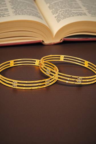 Gold plated set of 2 american diamond machine cut bangles