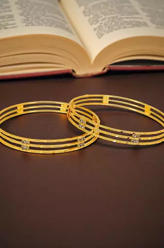 Gold plated set of 2 american diamond machine cut bangles