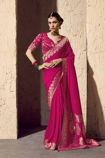 Rani pink faux crepe georgette zari weaving work saree