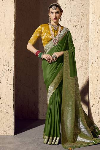 Green faux crepe georgette zari weaving work saree