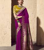 Dark magenta faux crepe georgette zari weaving work saree