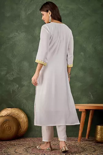 Roman silk blend yellow casual wear embroidery work readymade kurti with pant