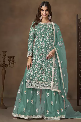 Net embroidered turquoise salwar kameez