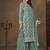 Net embroidered turquoise salwar kameez