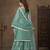 Net embroidered turquoise salwar kameez