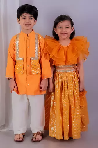 Orange embroidered organza lehenga set