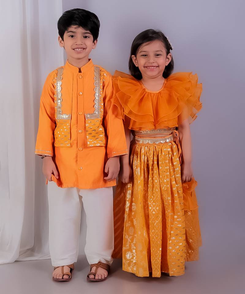 Orange embroidered organza lehenga set