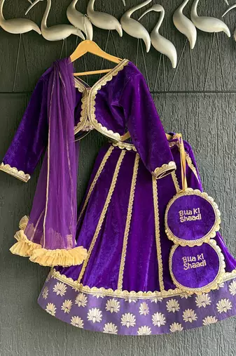 Purple embroidered velvet lehenga set