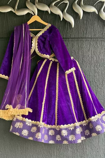 Purple embroidered velvet lehenga set