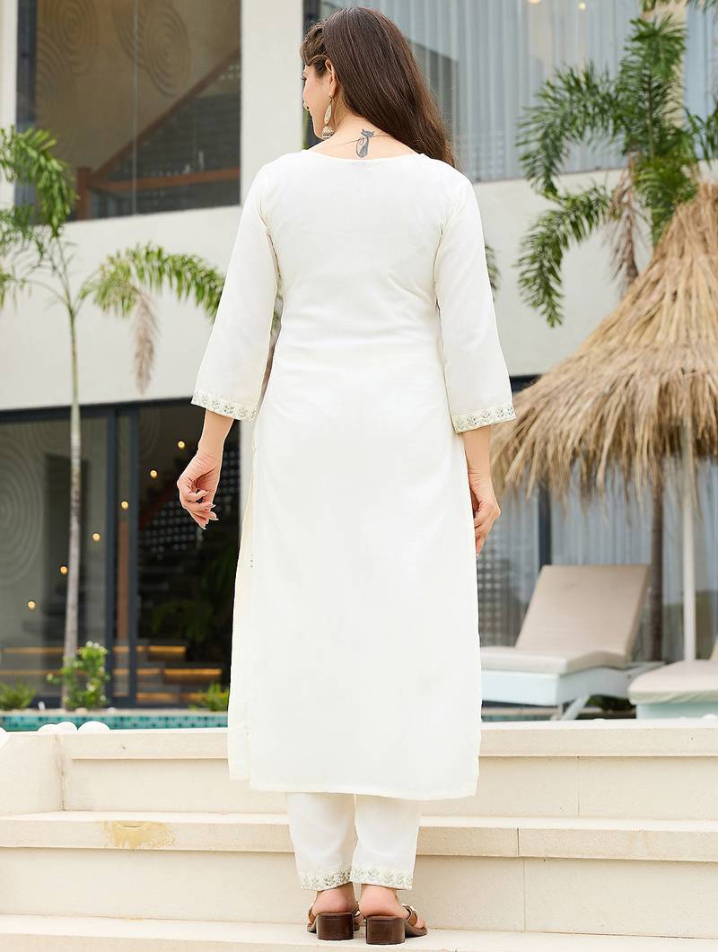 White rayon slub thread embroidered with sequins work kurta pant set