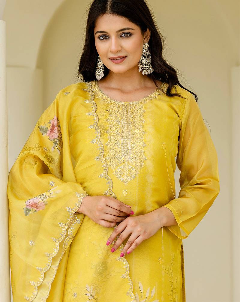 Yellow shimmer organza print with thread embroidery work kurta pant set