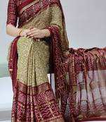 yellow color bandhni printed with foil work moss art silk saree with unstitched blouse