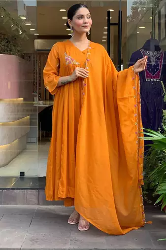 Floral embroidered orange v neck cotton kurta set with trouser & dupatta