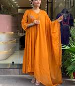 Floral embroidered orange v neck cotton kurta set with trouser & dupatta