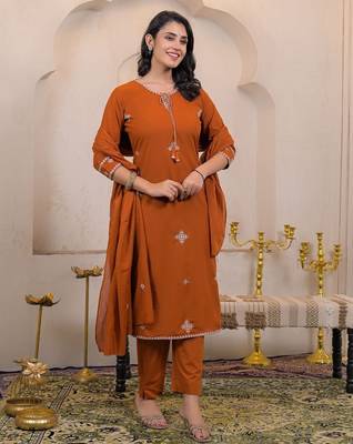Floral embroidered orange round neck cotton kurta set with trouser & dupatta 2