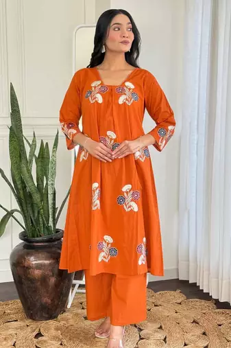 Floral embroidered orange v neck cotton kurta set with trouser