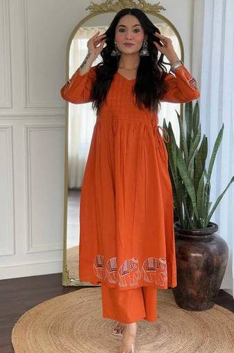 Floral embroidered orange v neck cotton kurta set with trouser