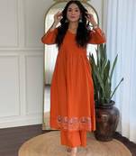 Floral embroidered orange v neck cotton kurta set with trouser