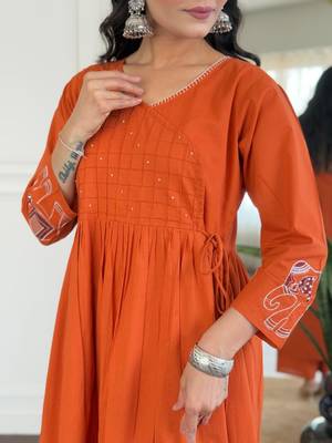 Floral embroidered orange v neck cotton kurta set with trouser 4