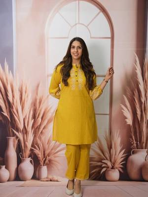 Floral embroidered yellow round neck cotton kurta set with trouser 1