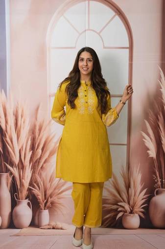 Floral embroidered yellow round neck cotton kurta set with trouser