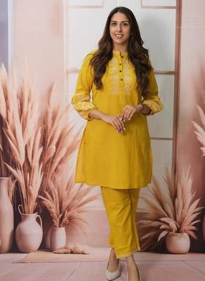 Floral embroidered yellow round neck cotton kurta set with trouser 2