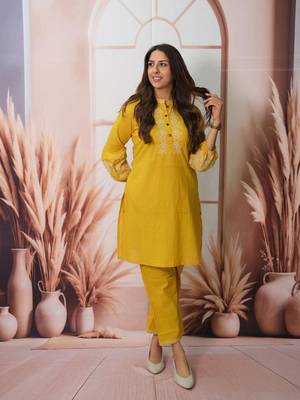 Floral embroidered yellow round neck cotton kurta set with trouser 3