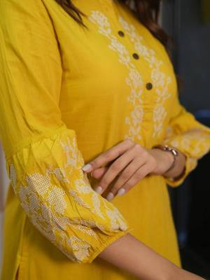 Floral embroidered yellow round neck cotton kurta set with trouser 4
