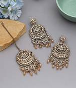 Gold color kundan earrings tikka set