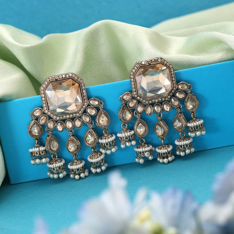 Gold color kundan earrings