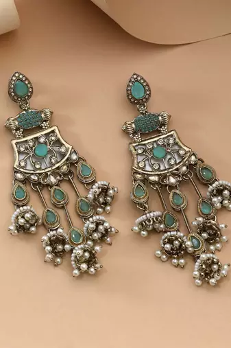 Light green color kundan earrings