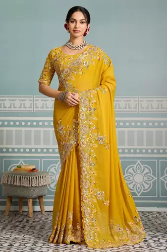 mesmerizing rani pink embroidered georgette wedding saree with blouse