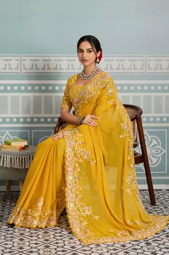 mesmerizing rani pink embroidered georgette wedding saree with blouse