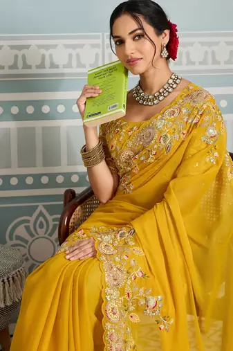 mesmerizing rani pink embroidered georgette wedding saree with blouse