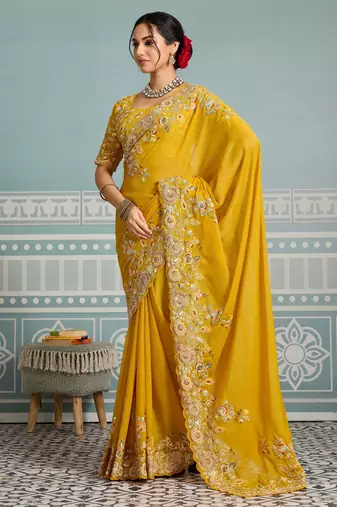 mesmerizing rani pink embroidered georgette wedding saree with blouse