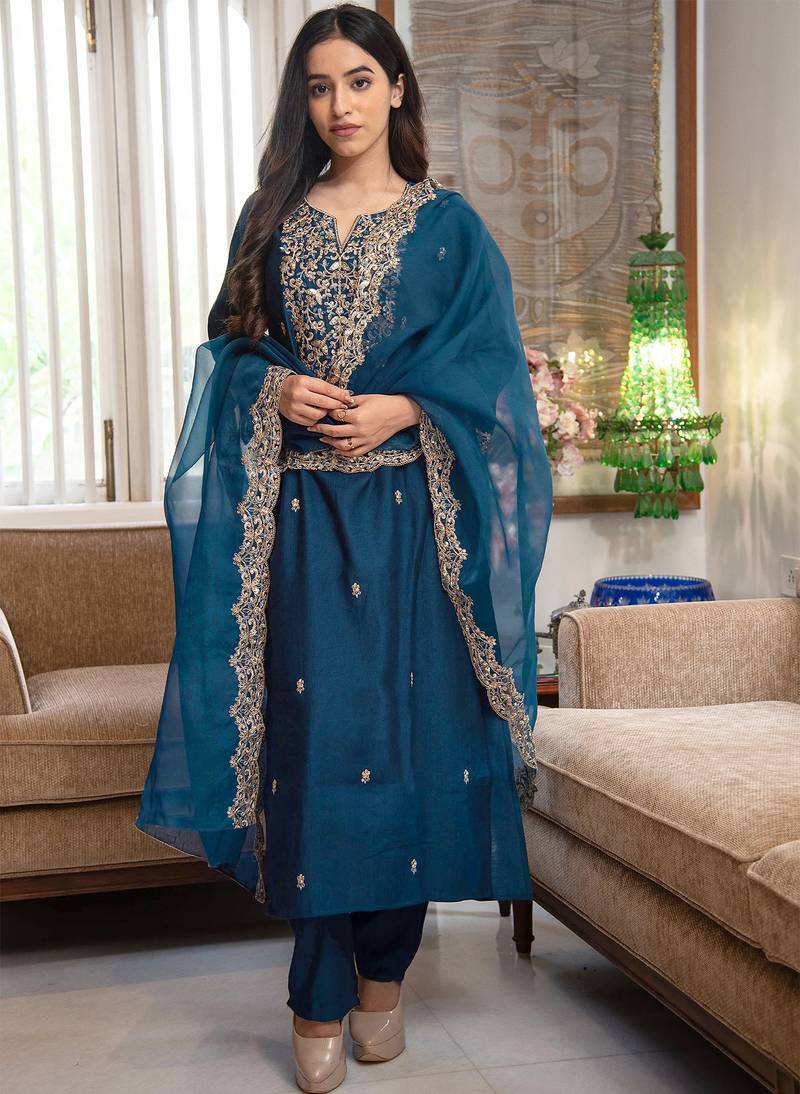 Deep teal blue embroidered silk suit set with scalloped organza dupatta