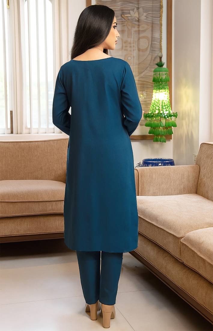 Deep teal blue embroidered silk suit set with scalloped organza dupatta