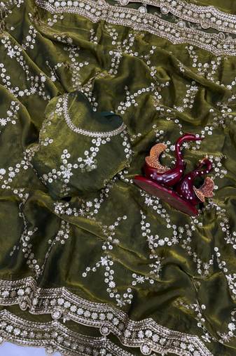 green color embroidered space silk blend saree