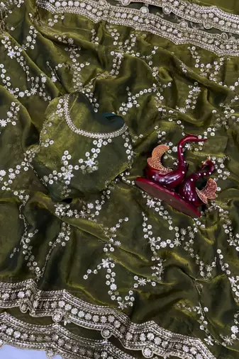 green color embroidered space silk blend saree