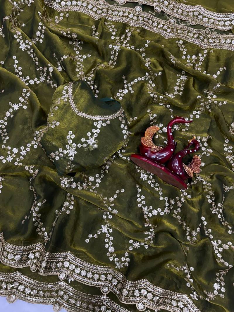 green color embroidered space silk blend saree