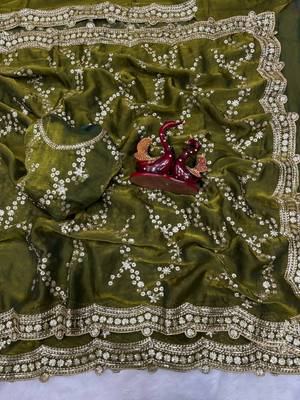 green color embroidered space silk blend saree 4