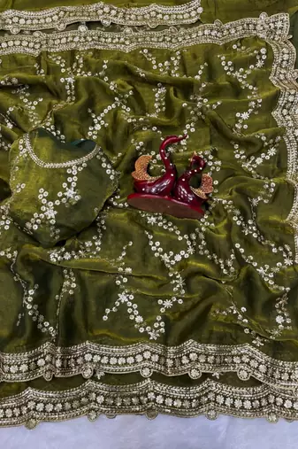 green color embroidered space silk blend saree