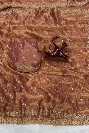 brown color embroidered space silk blend saree