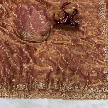 brown color embroidered space silk blend saree 2