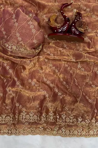 brown color embroidered space silk blend saree
