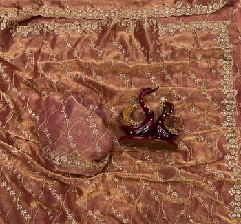 brown color embroidered space silk blend saree 3