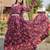 Purple Faux Georgette Printed Gown     Trendy & Lightweight Elegance