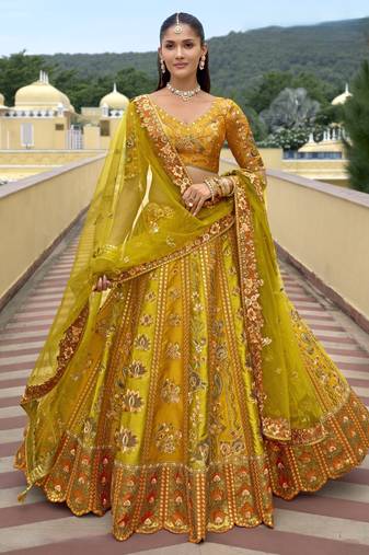 Yellow silk embroidered lehenga choli with dupatta
