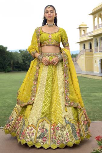Yellow silk embroidered lehenga choli with dupatta